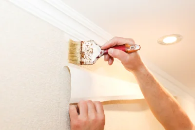 Pose de papier peint à Dominois — revêtements muraux et toiles de verre